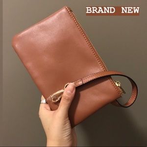 Brand new brown faux leather pouch